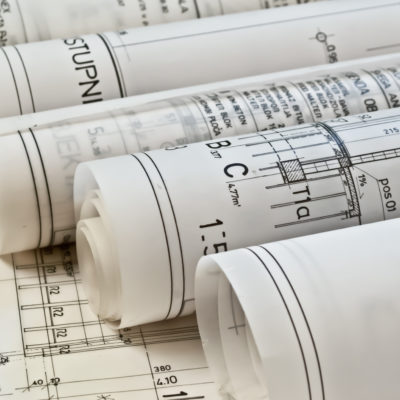 Four rolls of tracing paper printing showing different plans